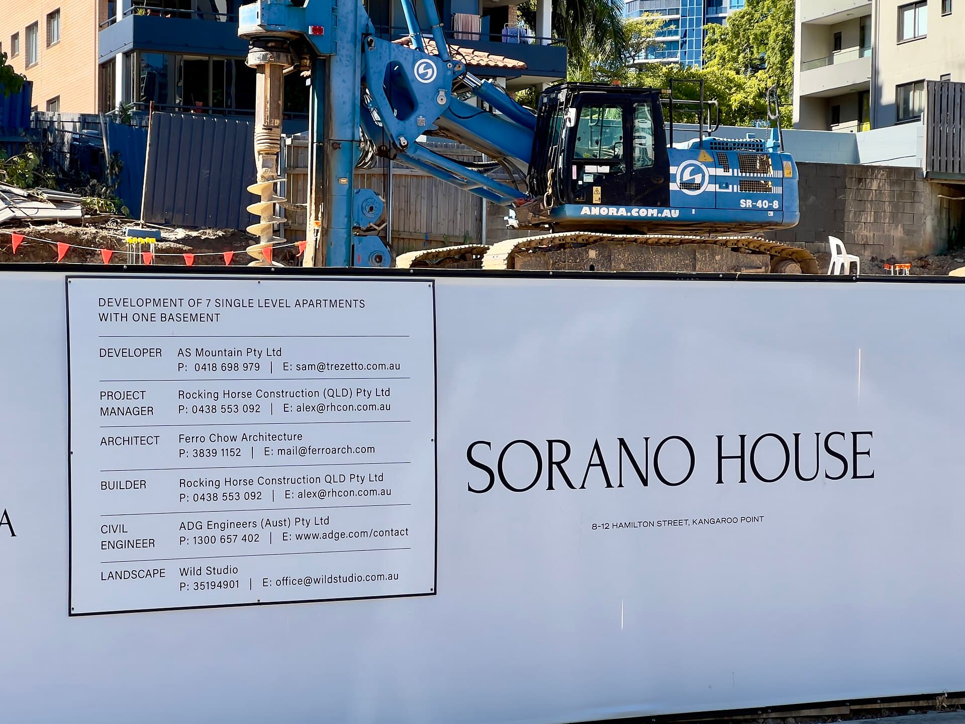 A house under construction in Kangaroo Point, Queensland, with timber framing and incomplete cladding.