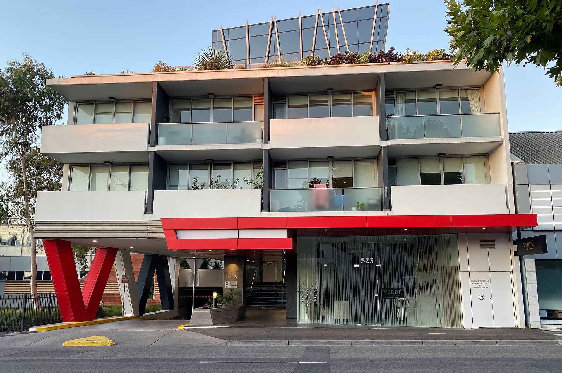A first-floor balcony on a masonry building in Boroondara, Melbourne, where fall protection and weatherproofing meet.