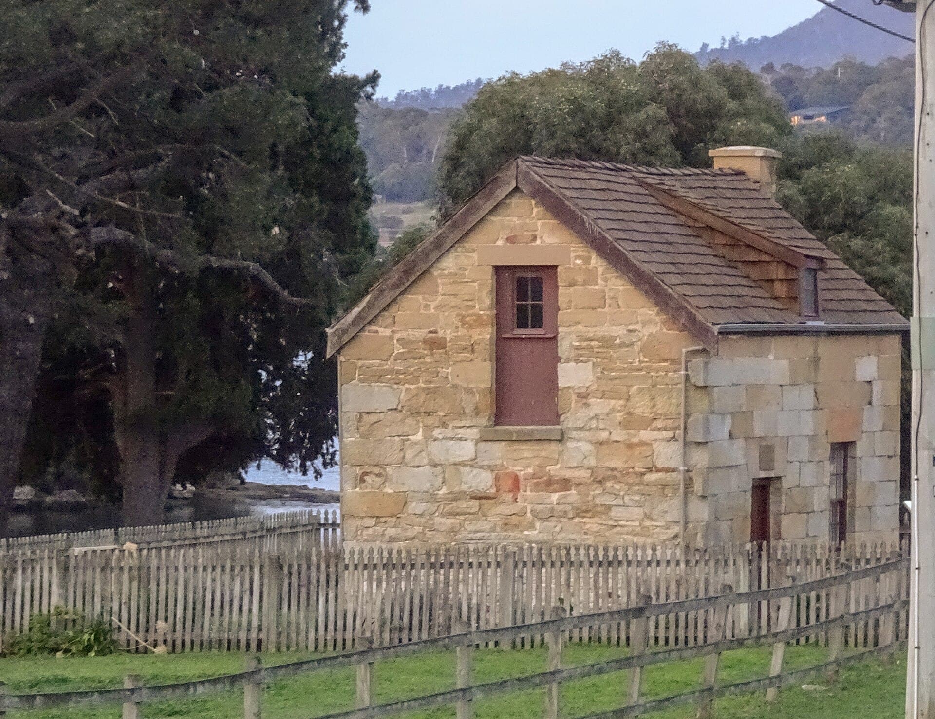 A sandstone heritage building in Austins Ferry, Tasmania, the kind of older masonry where damp and salt damage are often misread.